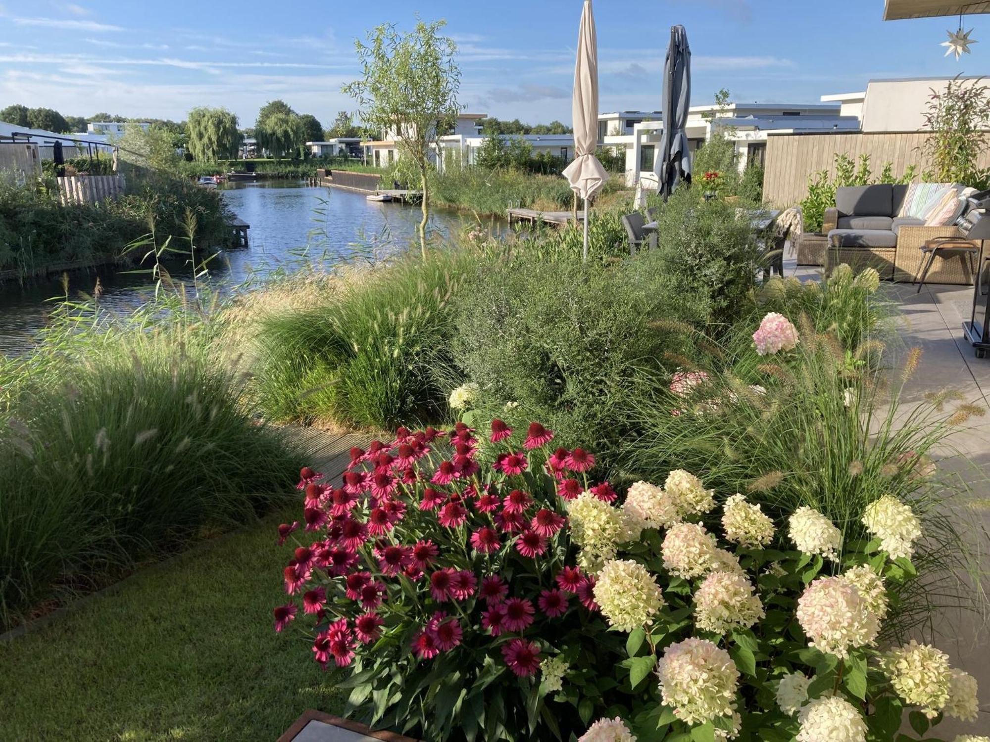 Family With Garden And Jetty Zeewolde
